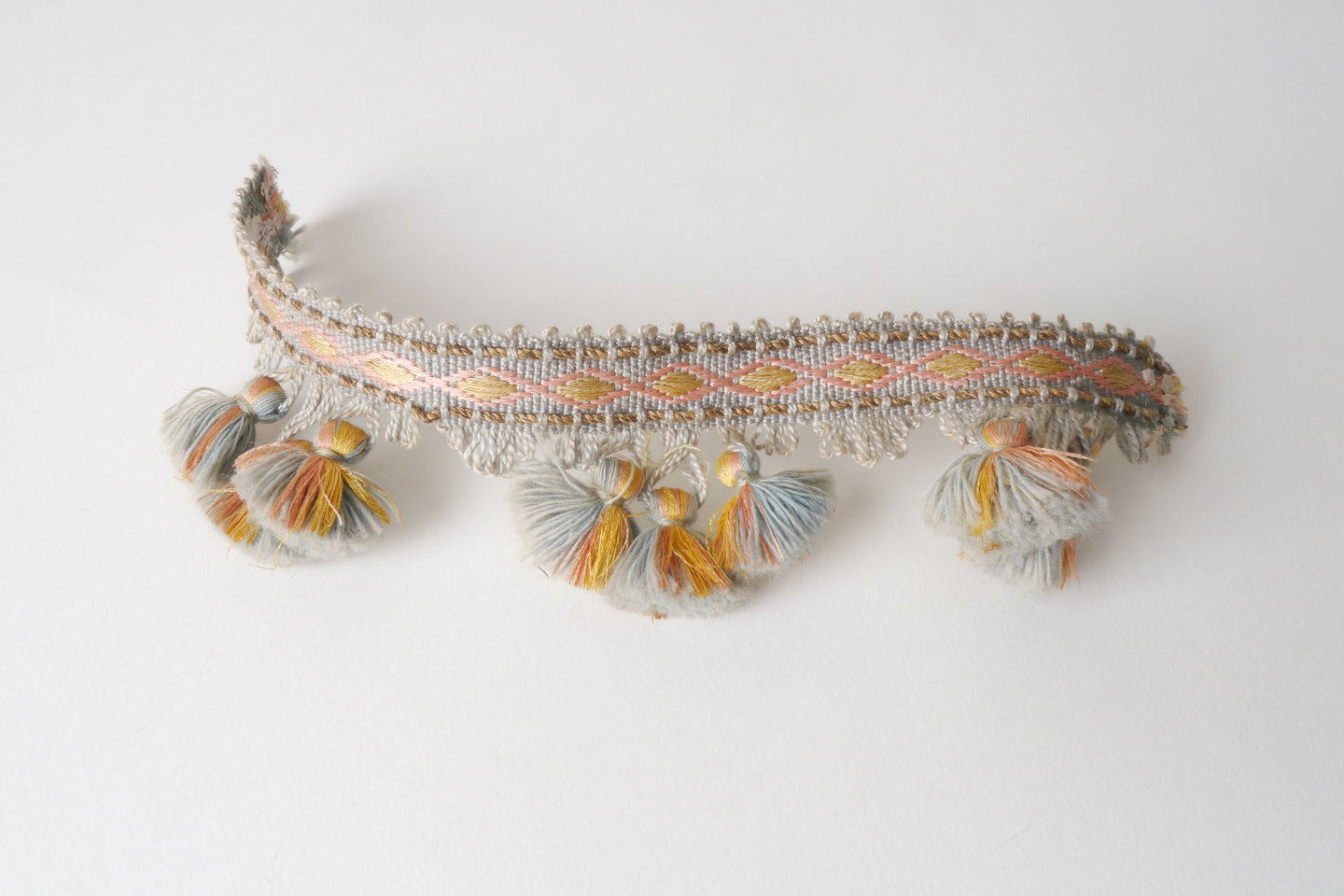 Frange als onderdeel voor het vervaardigen van passement