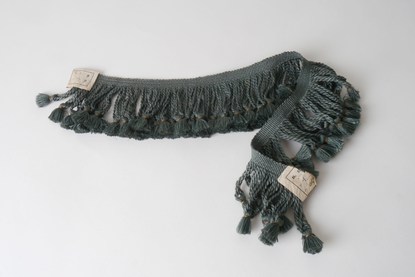 Frange als onderdeel voor het vervaardigen van passement