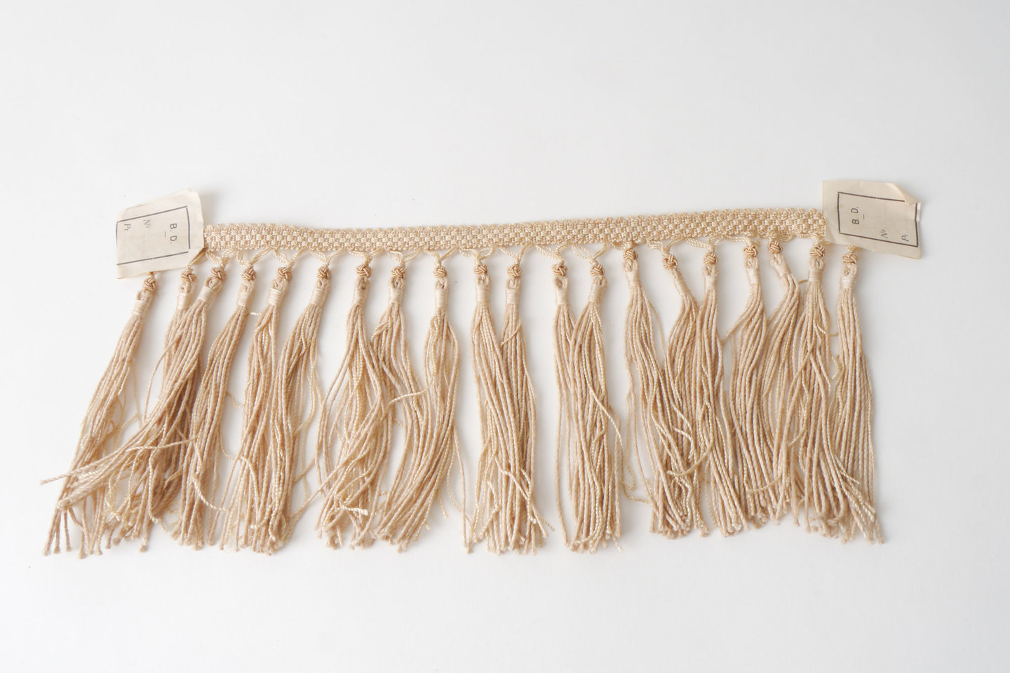 Frange als onderdeel voor het vervaardigen van passement