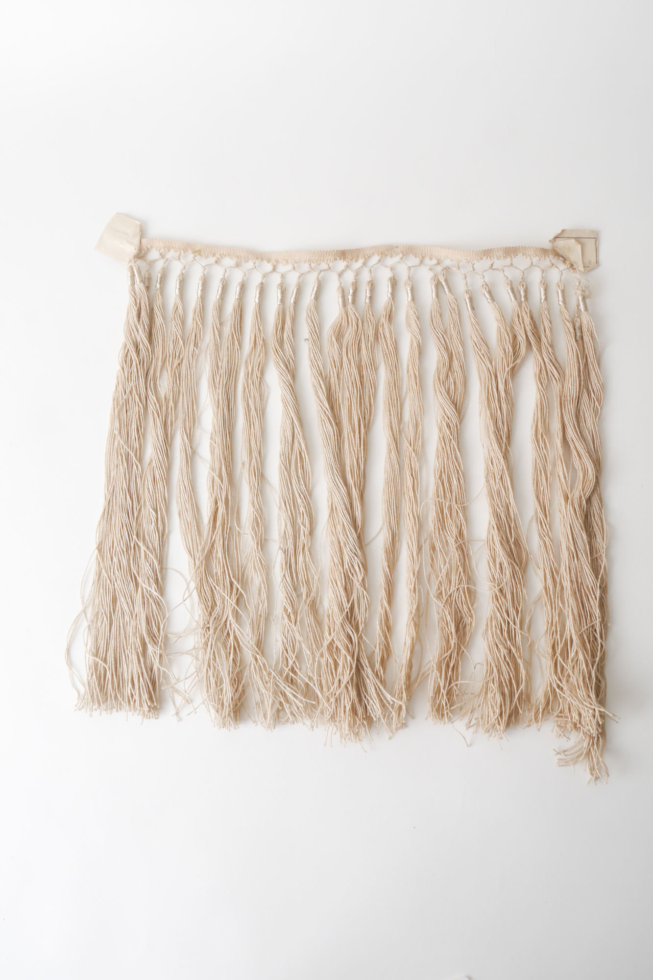 Frange als onderdeel voor het vervaardigen van passement