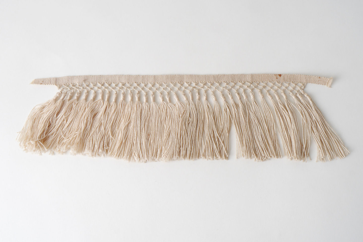 Frange als onderdeel voor het vervaardigen van passement