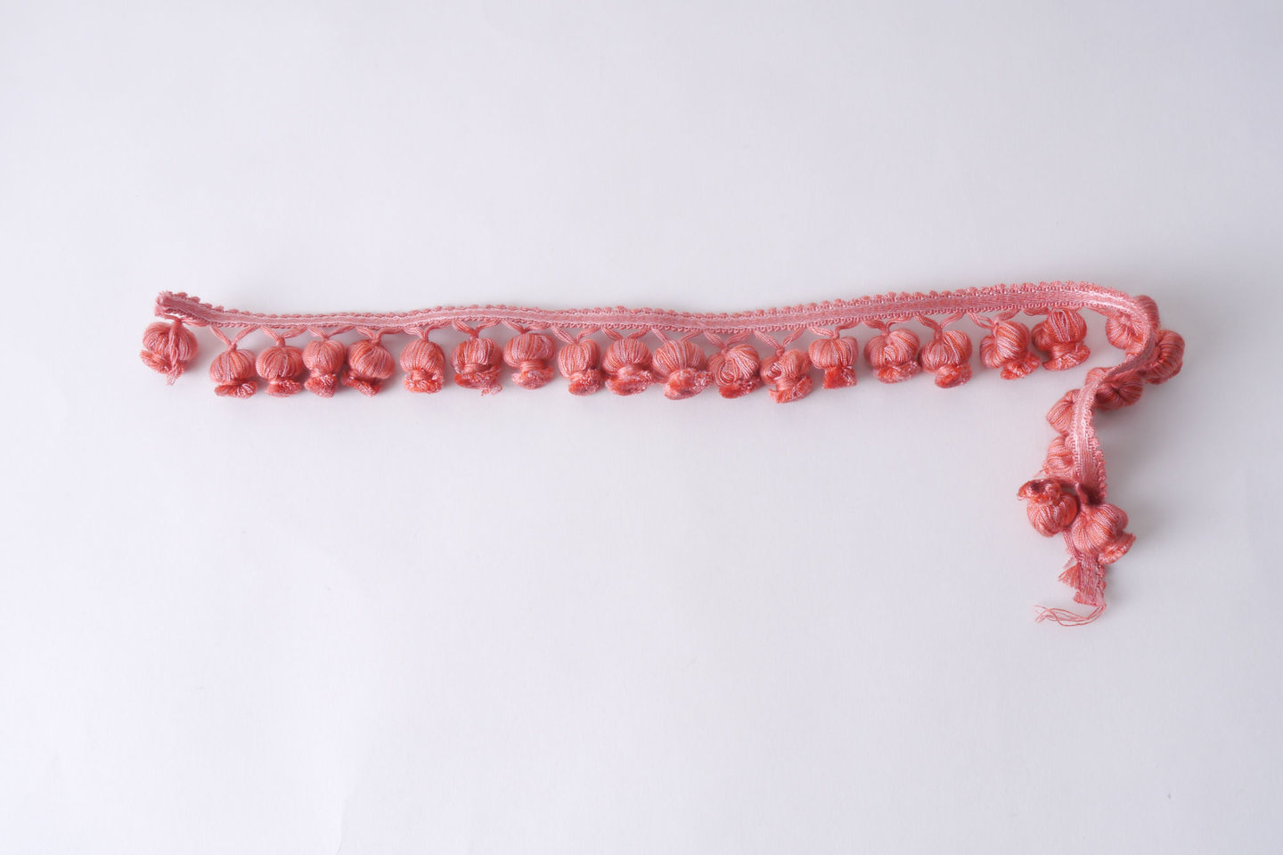 Frange als onderdeel voor het vervaardigen van passement