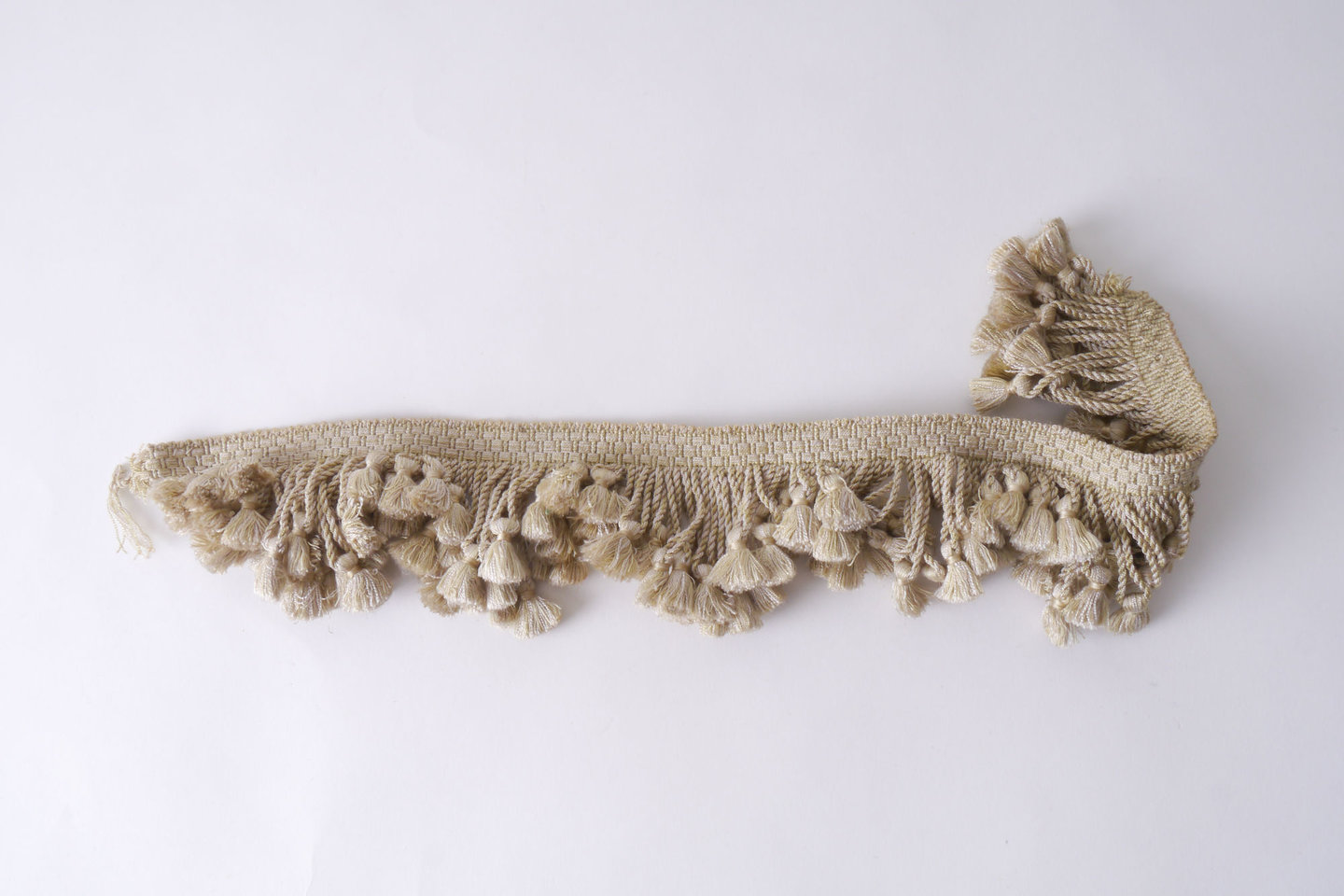 Frange als onderdeel voor het vervaardigen van passement