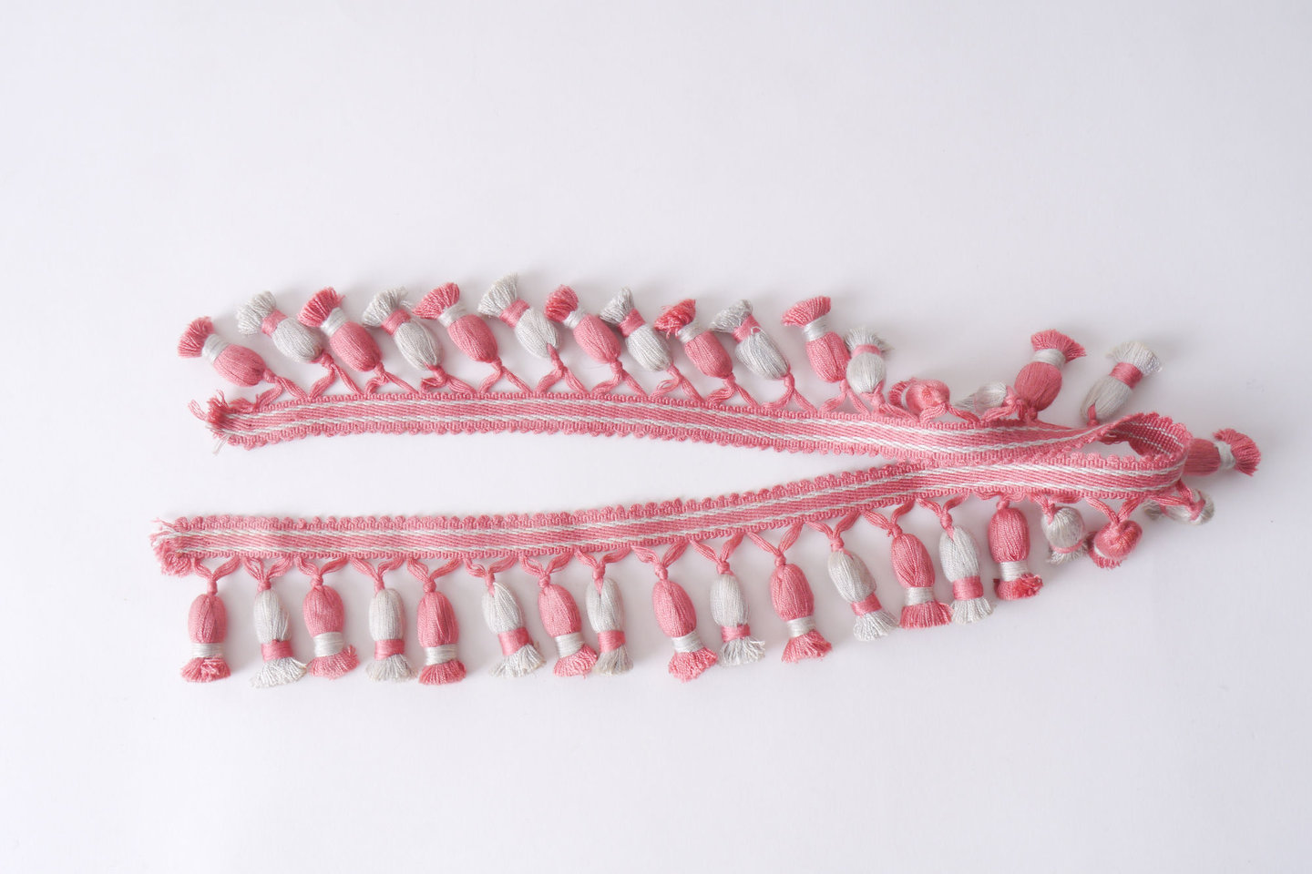 Frange als onderdeel voor het vervaardigen van passement