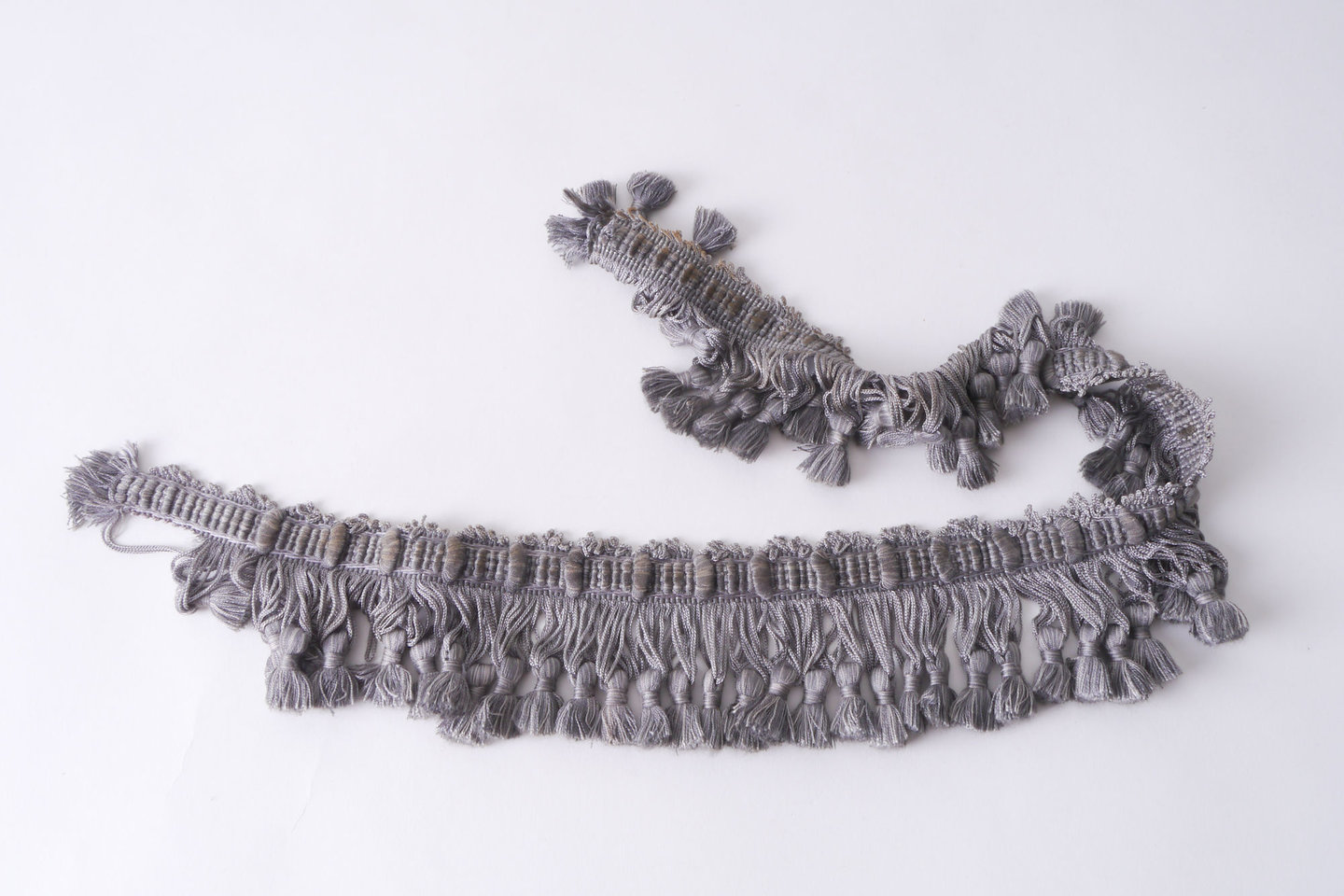 Frange als onderdeel voor het vervaardigen van passement