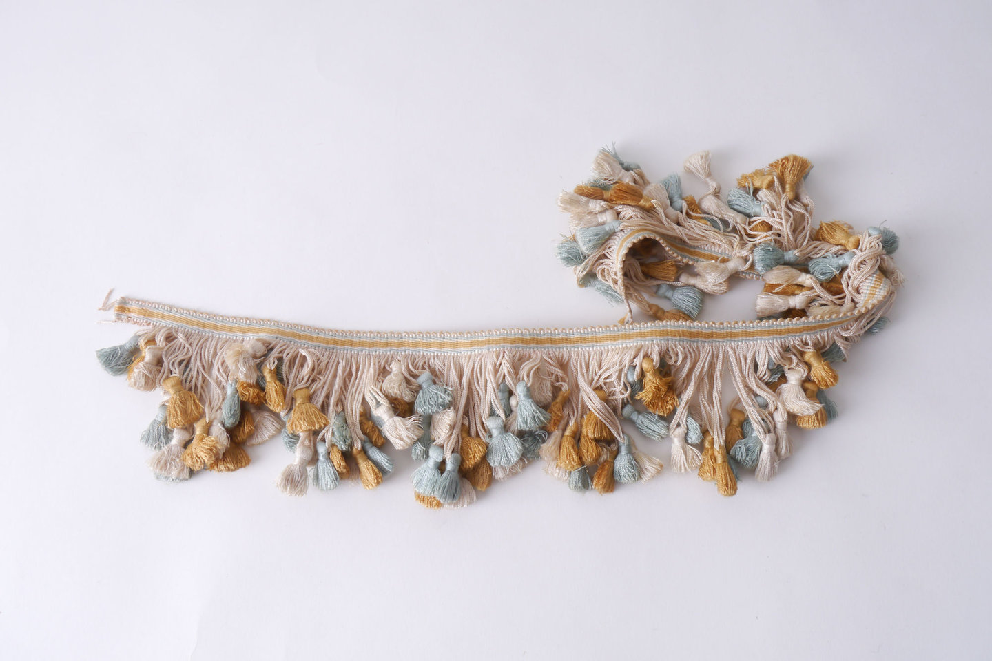 Frange als onderdeel voor het vervaardigen van passement