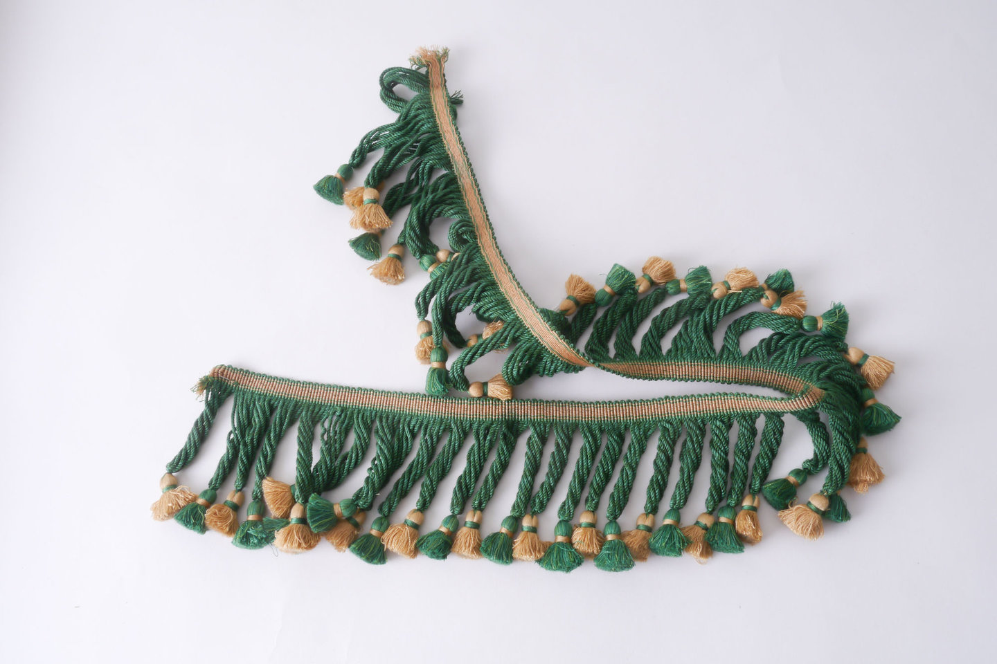 Frange als onderdeel voor het vervaardigen van passement