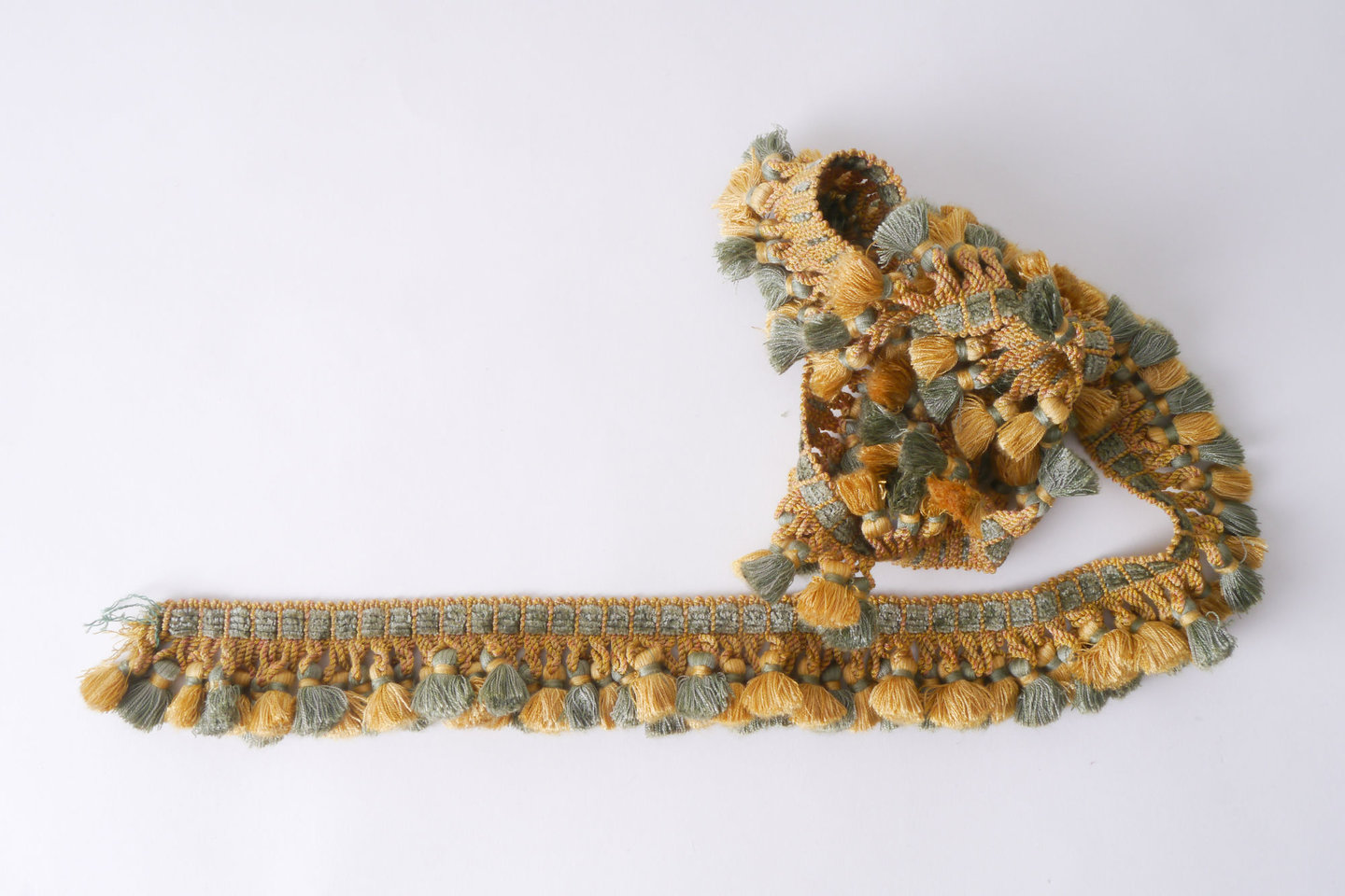 Frange als onderdeel voor het vervaardigen van passement