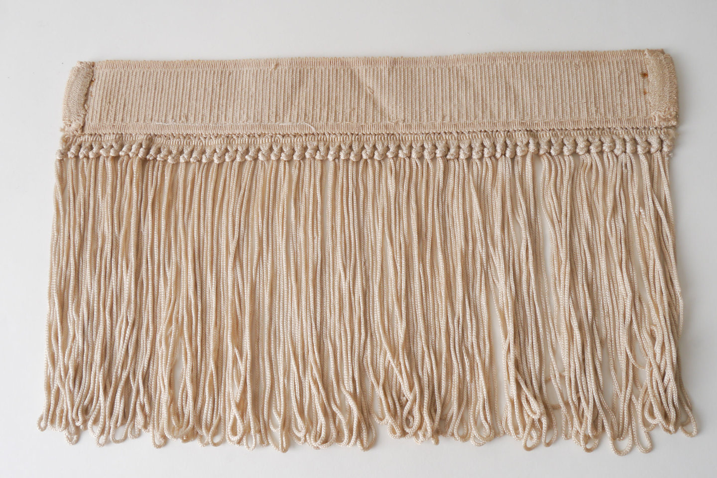 Frange als onderdeel voor het vervaardigen van passement