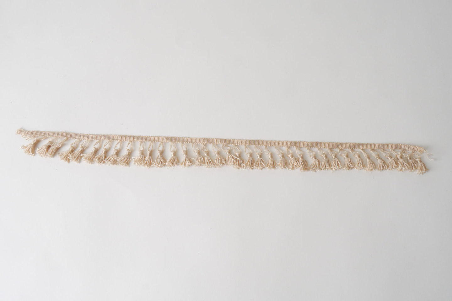 Frange als onderdeel voor het vervaardigen van passement