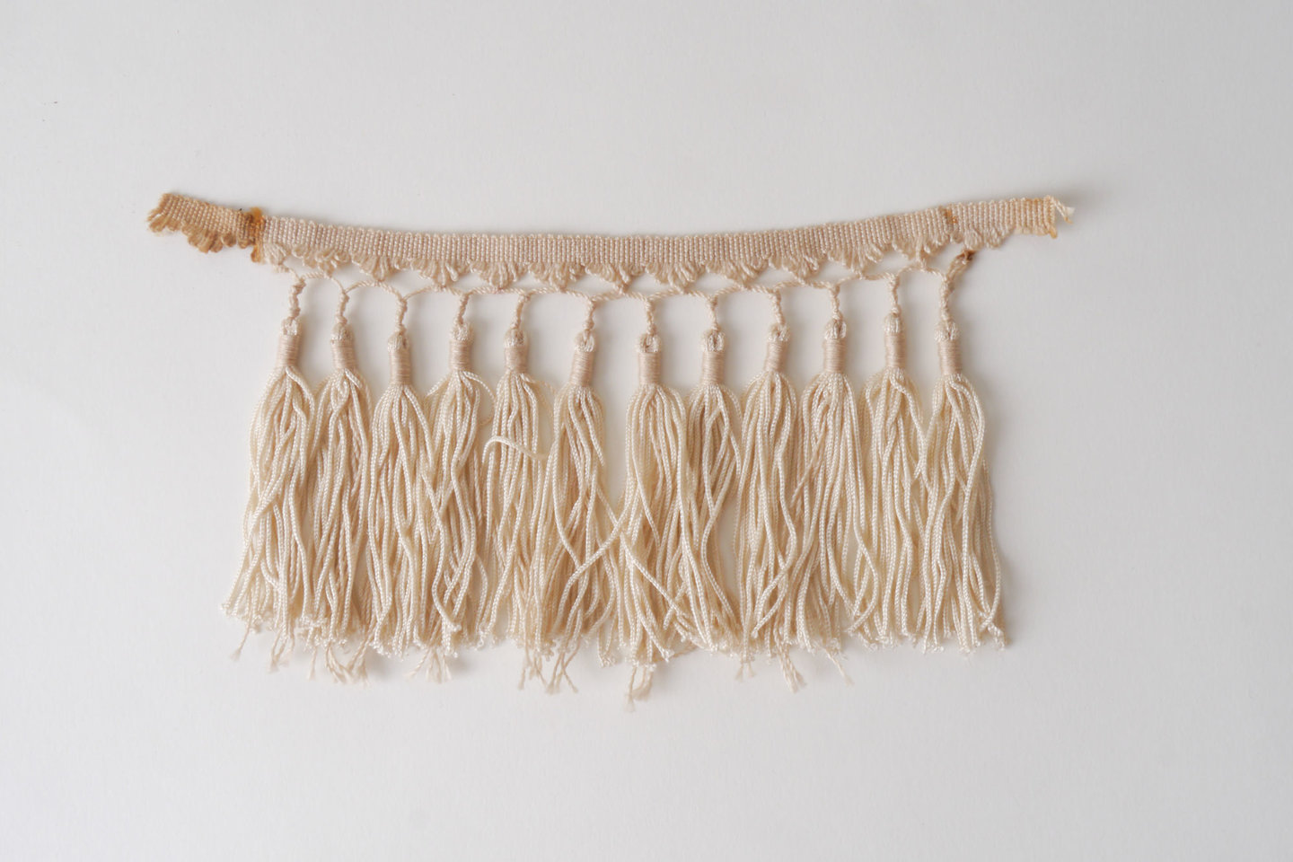 Frange als onderdeel voor het vervaardigen van passement