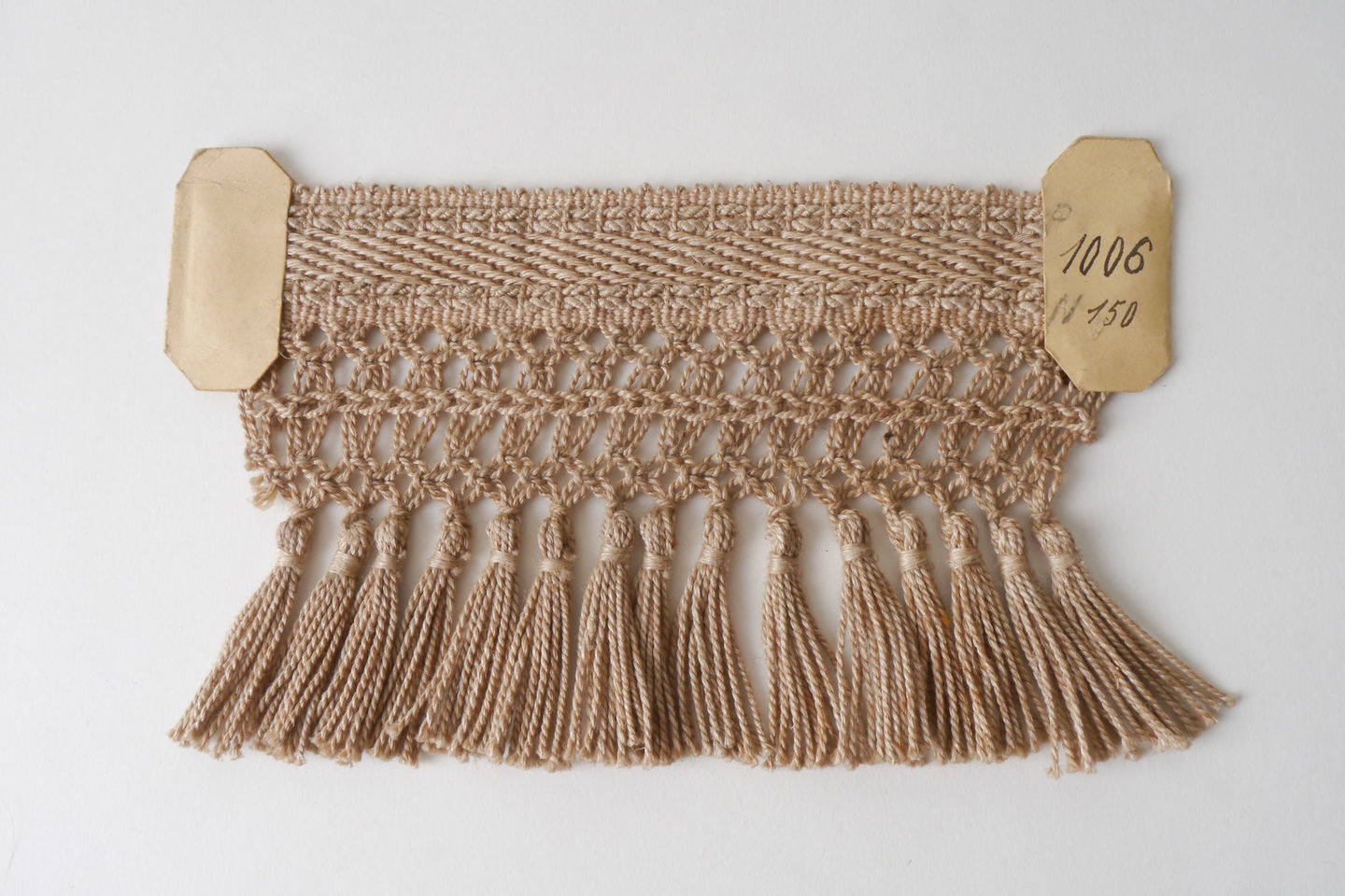 Frange als onderdeel voor het vervaardigen van passement