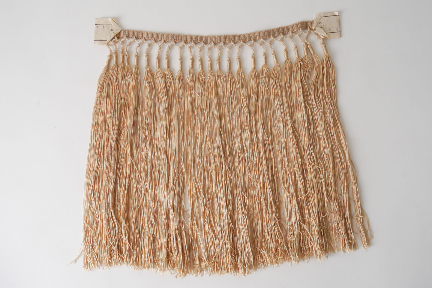 Frange als onderdeel voor het vervaardigen van passement