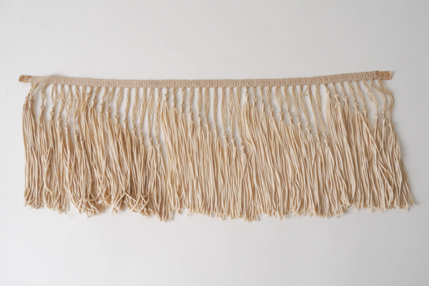 Frange als onderdeel voor het vervaardigen van passement