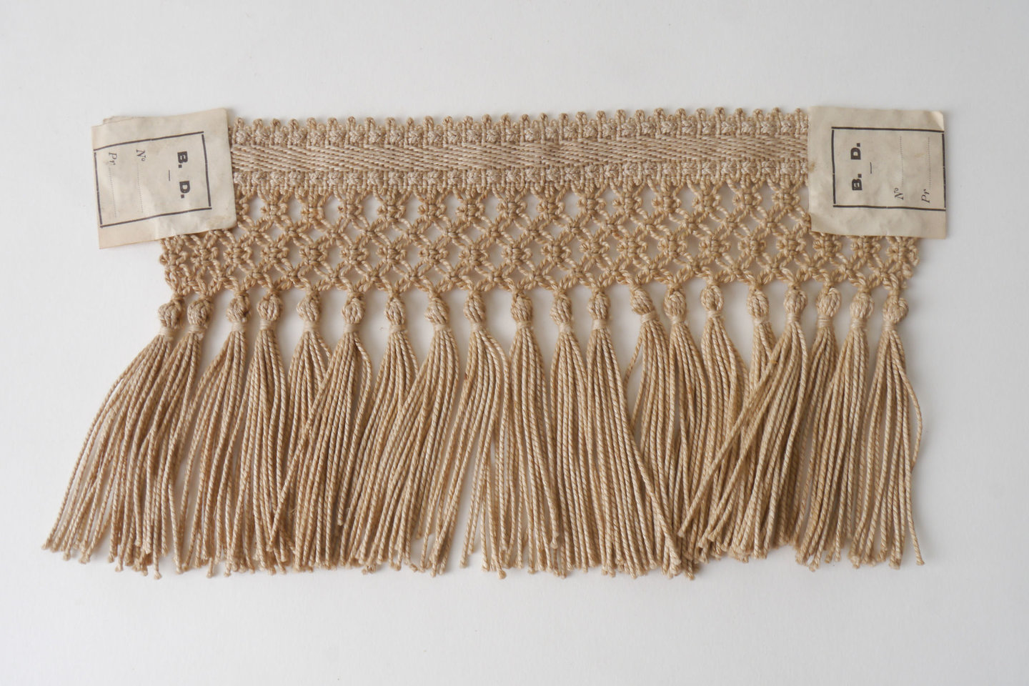 Frange als onderdeel voor het vervaardigen van passement