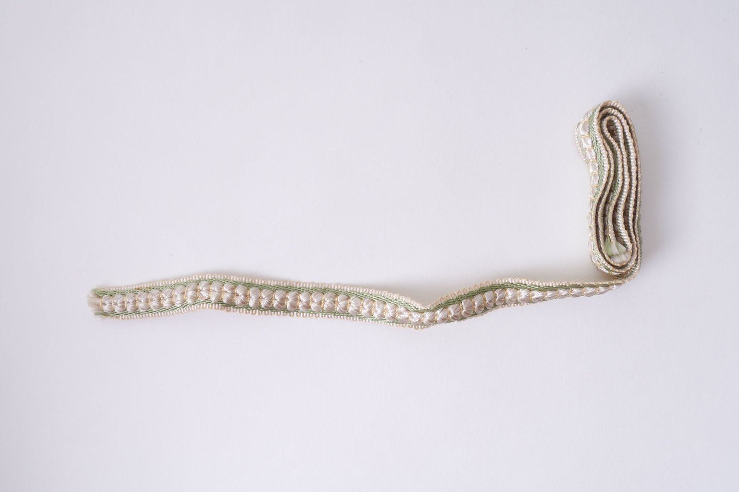 Galon of boord als onderdeel voor het vervaardigen van passement