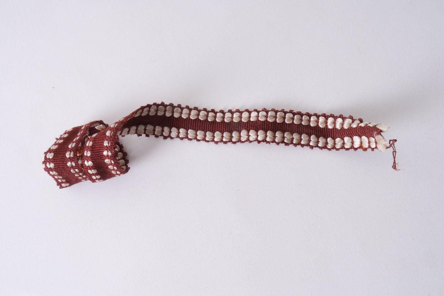 Galon of boord als onderdeel voor het vervaardigen van passement