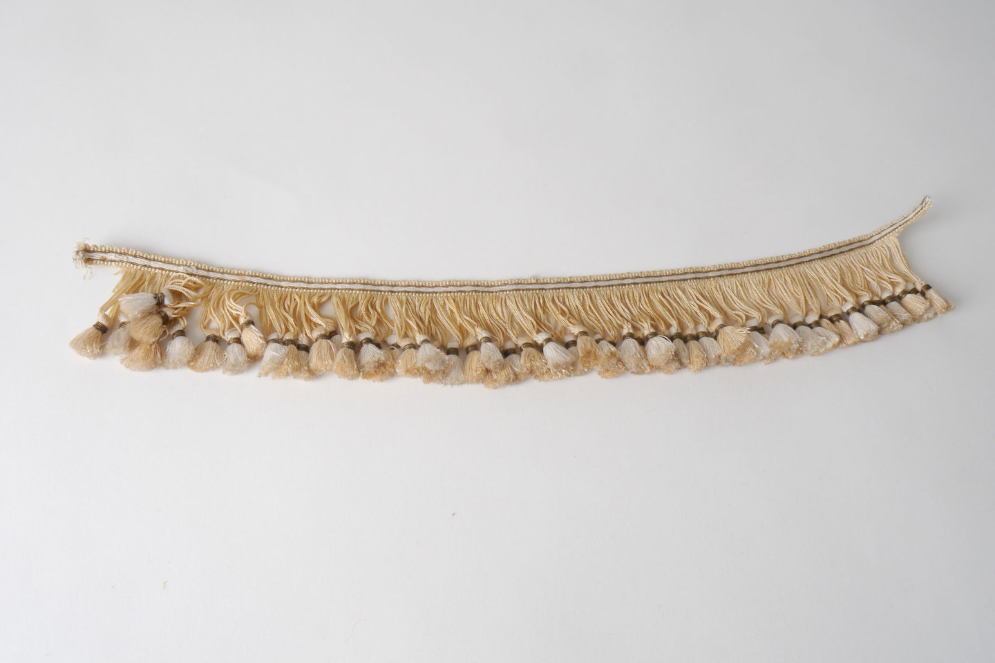 Frange als onderdeel voor het vervaardigen van passement