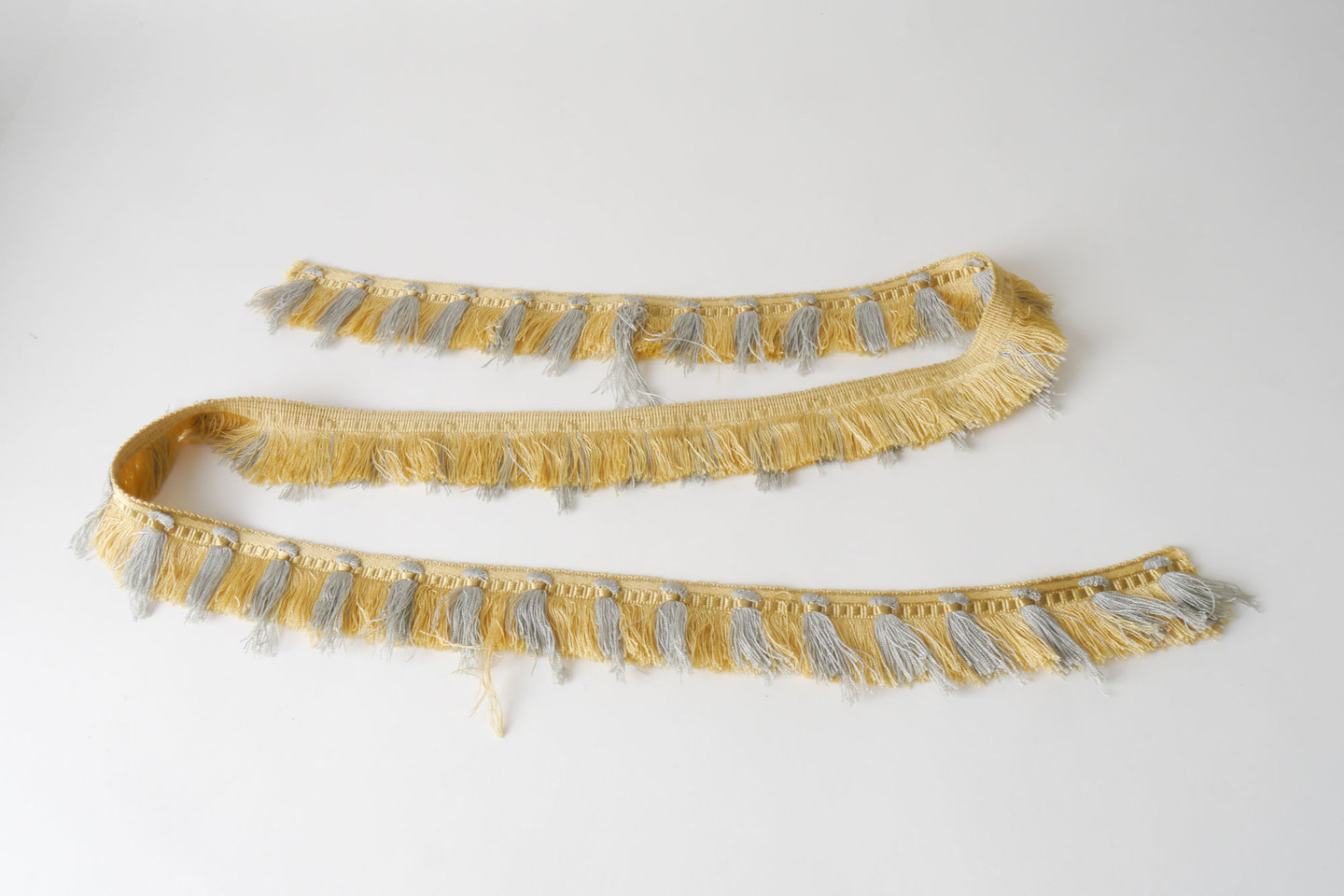 Effilé als onderdeel voor het vervaardigen van passement