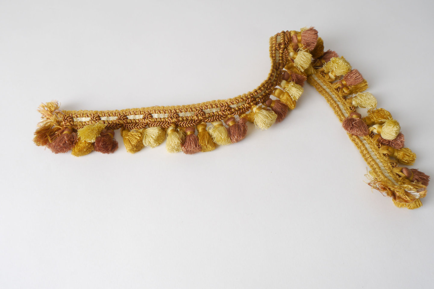 Frange als onderdeel voor het vervaardigen van passement