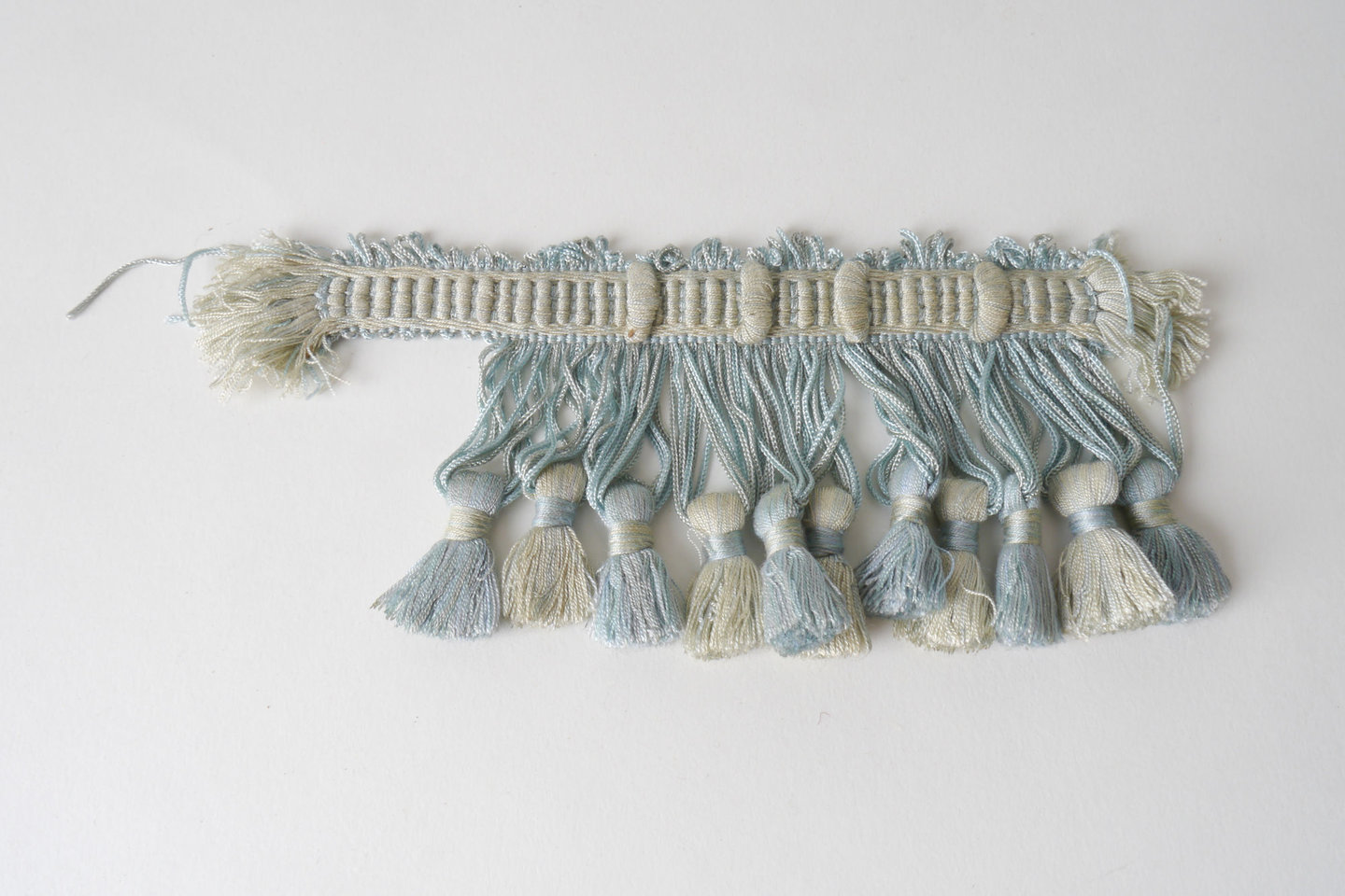 Frange als onderdeel voor het vervaardigen van passement