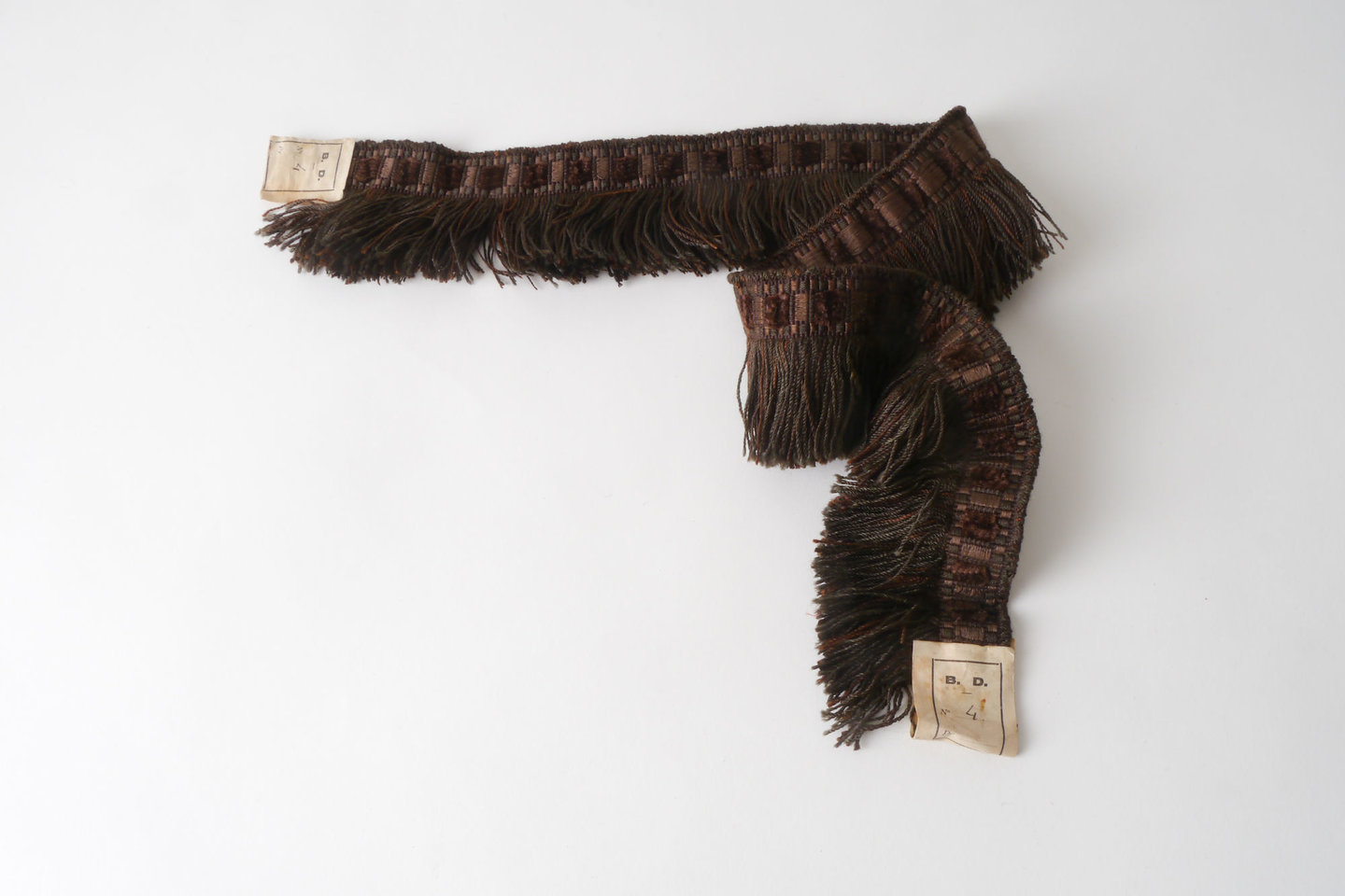 Effilé als onderdeel voor het vervaardigen van passement