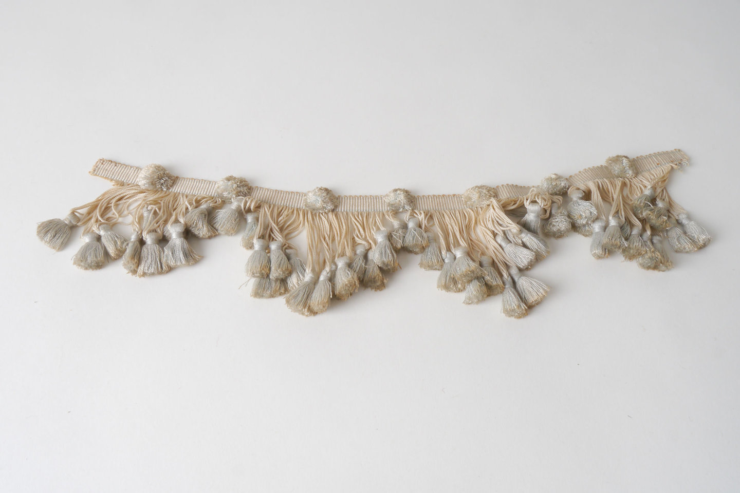 Frange als onderdeel voor het vervaardigen van passement