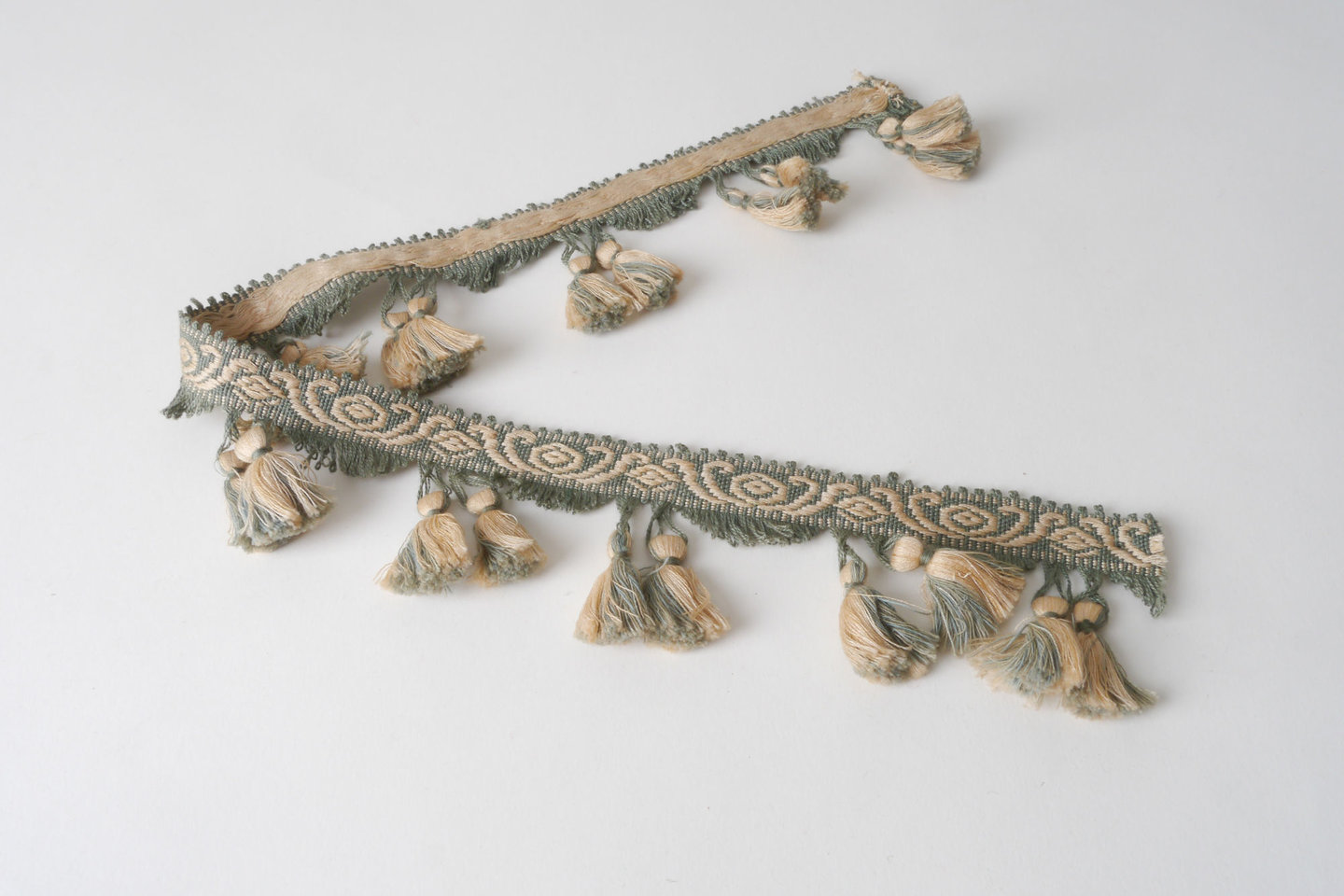 Frange als onderdeel voor het vervaardigen van passement