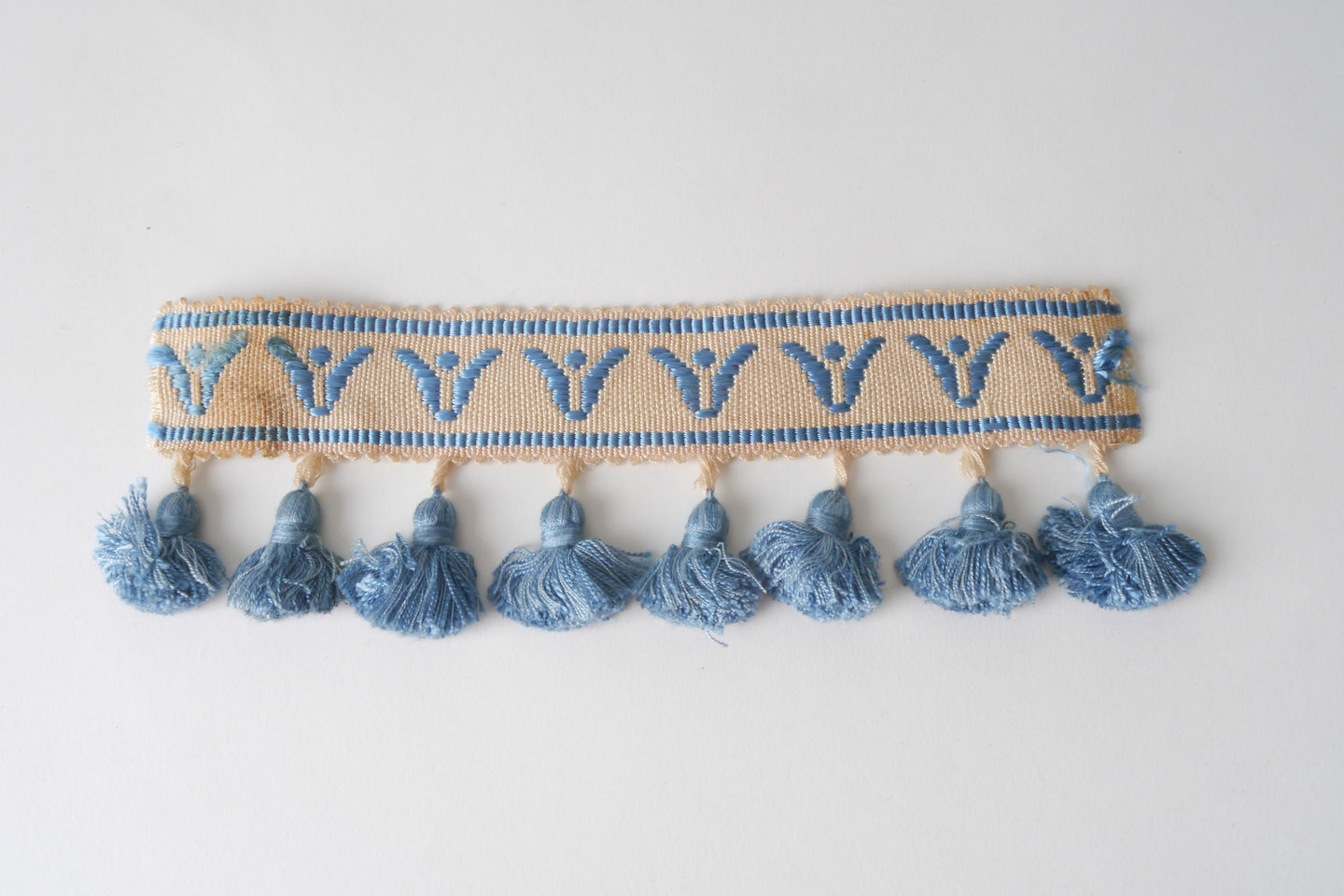 Frange als onderdeel voor het vervaardigen van passement