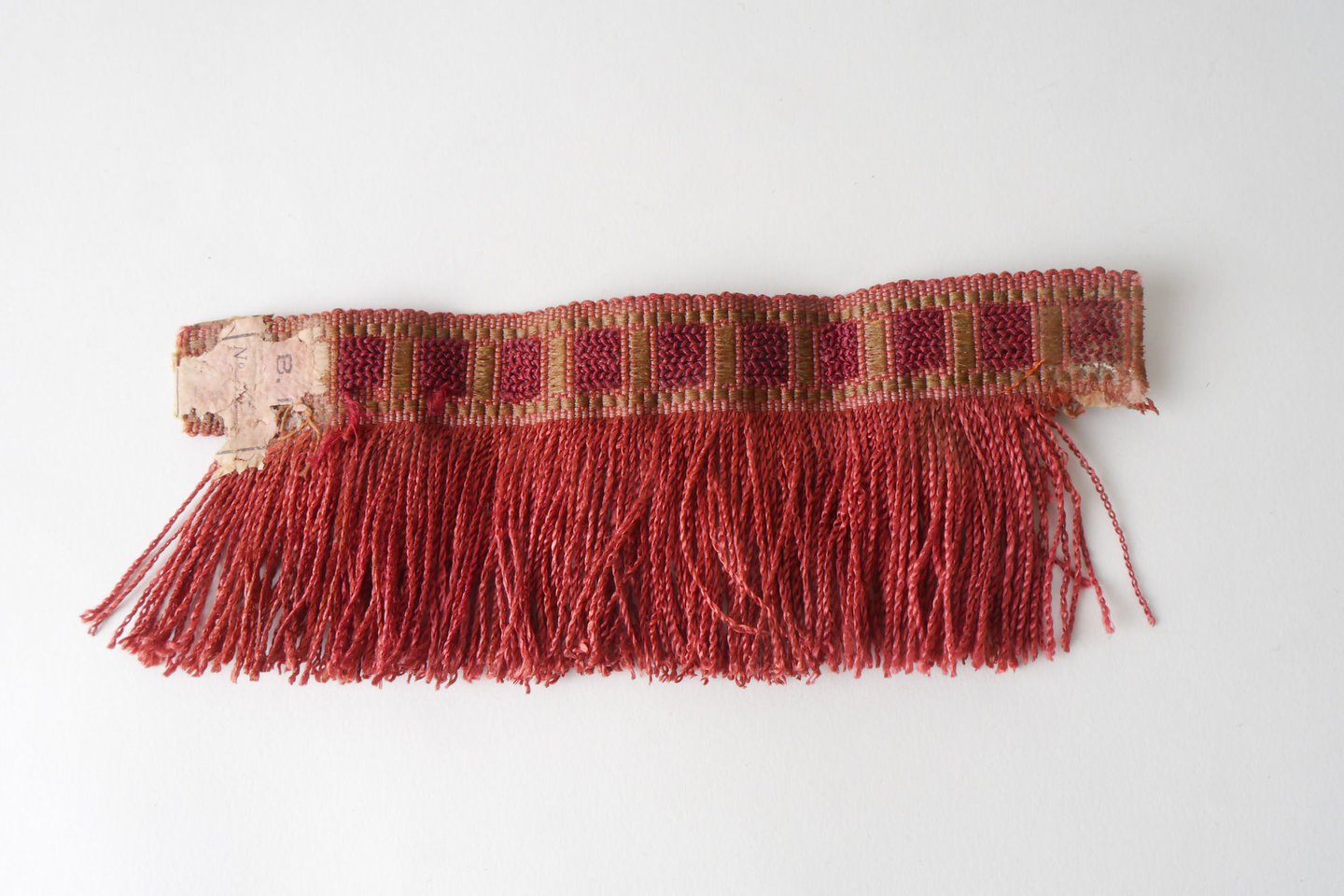 Effilé als onderdeel voor het vervaardigen van passement