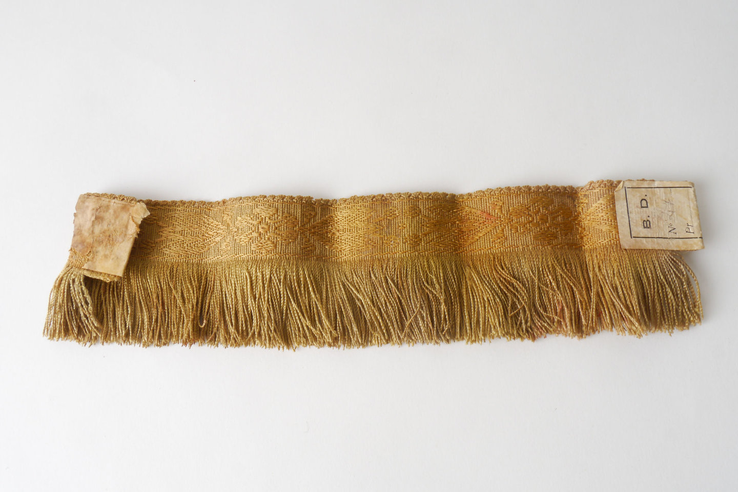 Effilé als onderdeel voor het vervaardigen van passement