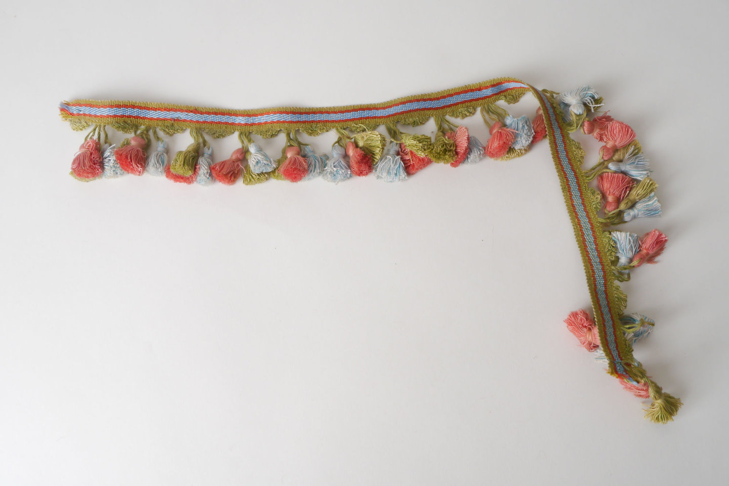 Frange als onderdeel voor het vervaardigen van passement