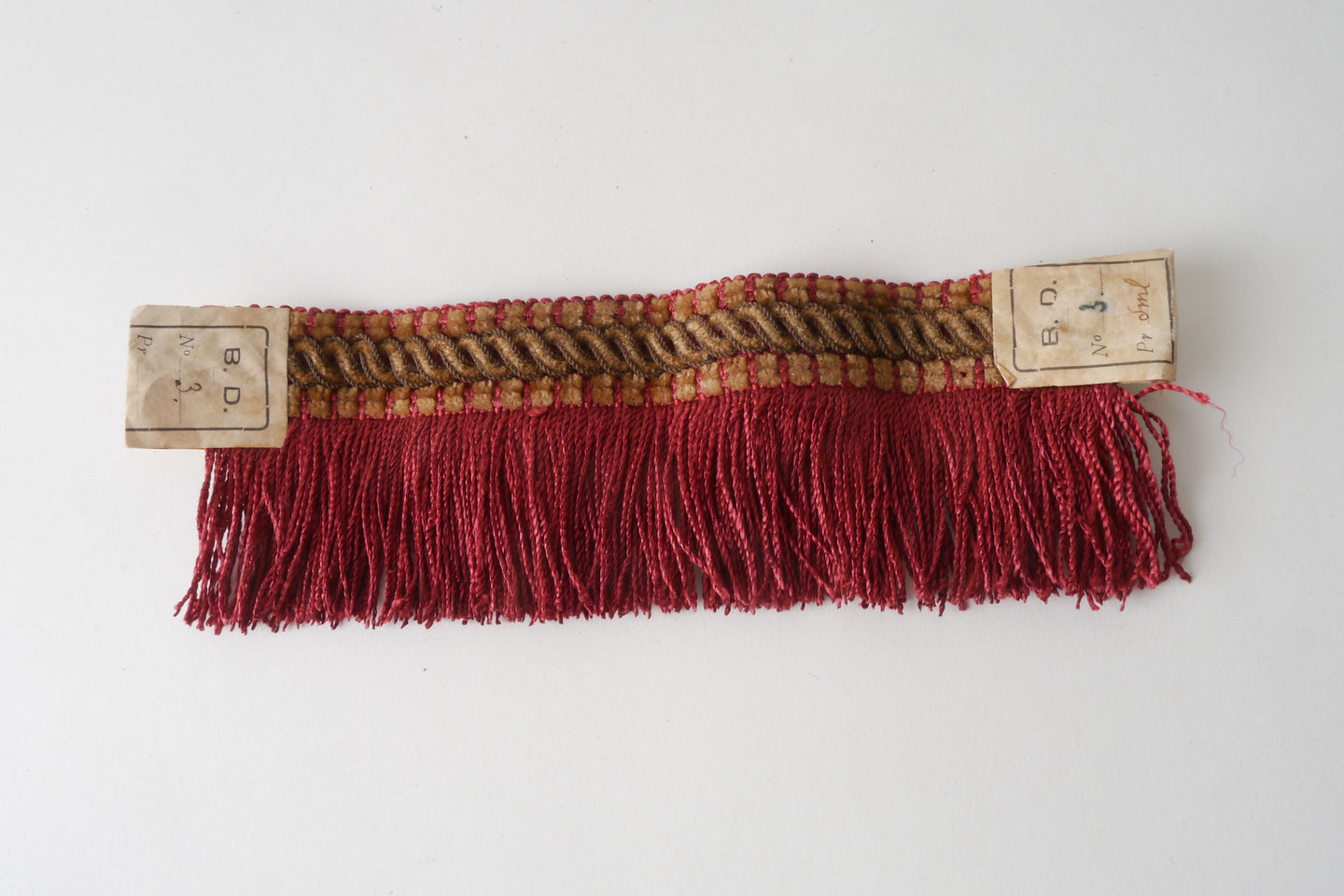 Effilé als onderdeel voor het vervaardigen van passement