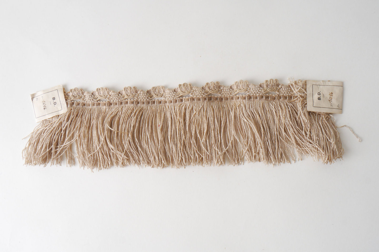 Effilé als onderdeel voor het vervaardigen van passement