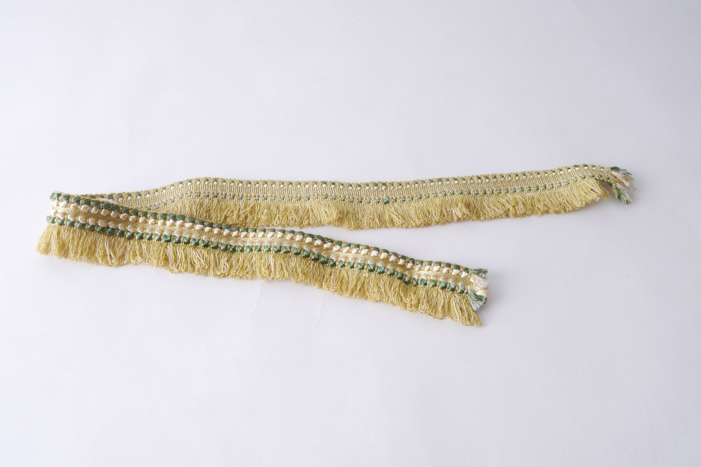 Effilé als onderdeel voor het vervaardigen van passement