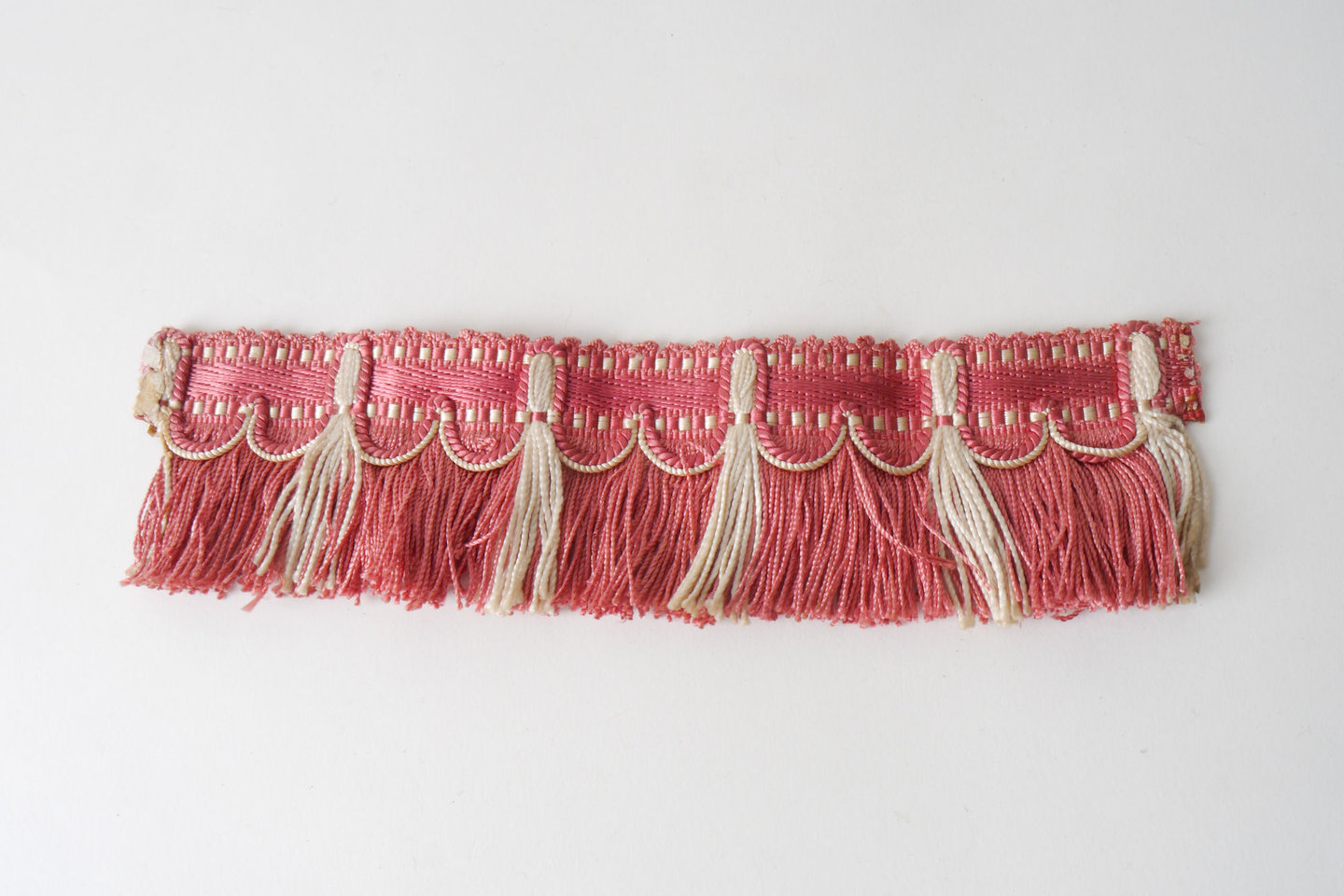 Effilé als onderdeel voor het vervaardigen van passement