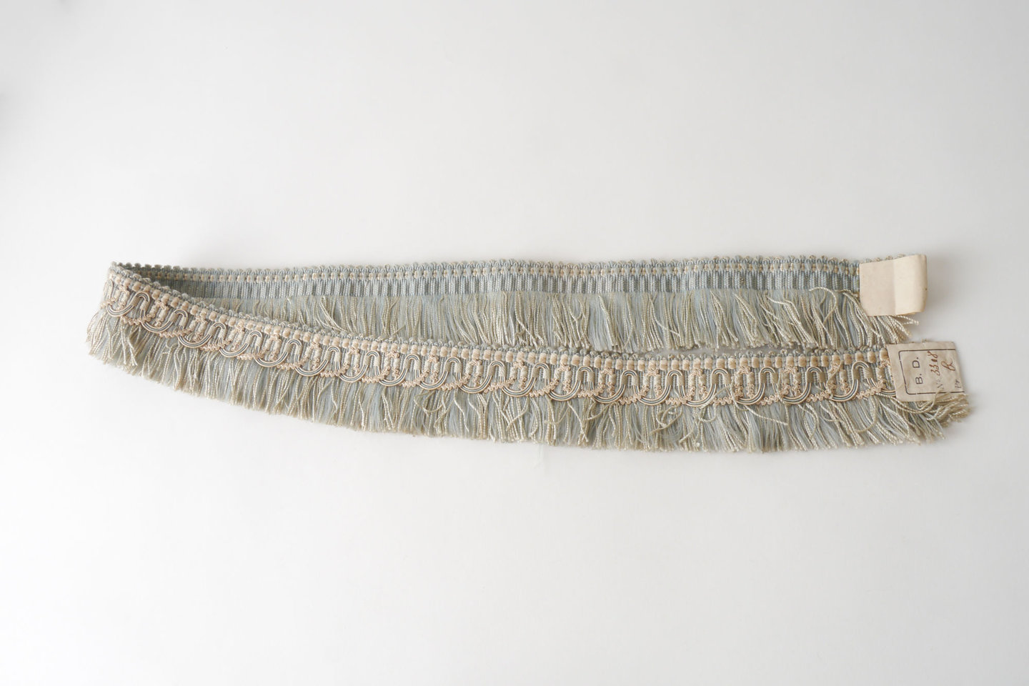 Effilé als onderdeel voor het vervaardigen van passement