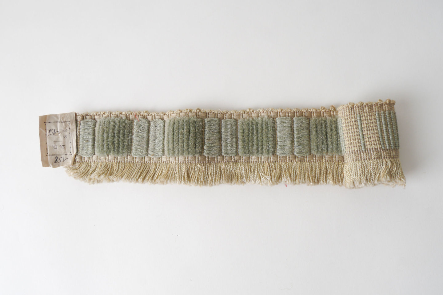 Effilé als onderdeel voor het vervaardigen van passement