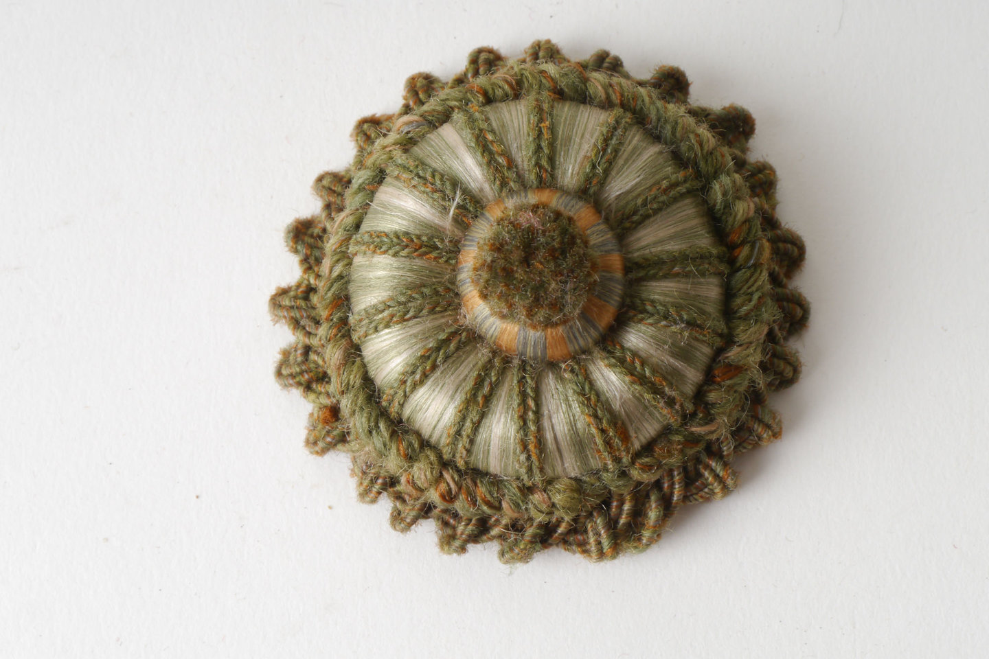 Macaron of rozet als onderdeel voor het vervaardigen van passement