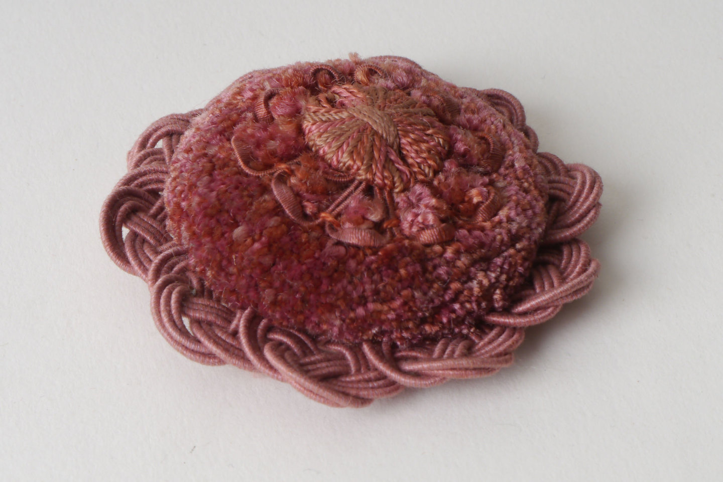 Macaron of rozet als onderdeel voor het vervaardigen van passement