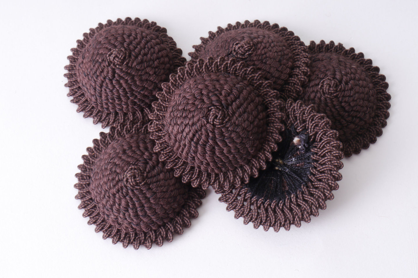 Macaron of rozet als onderdeel voor het vervaardigen van passement