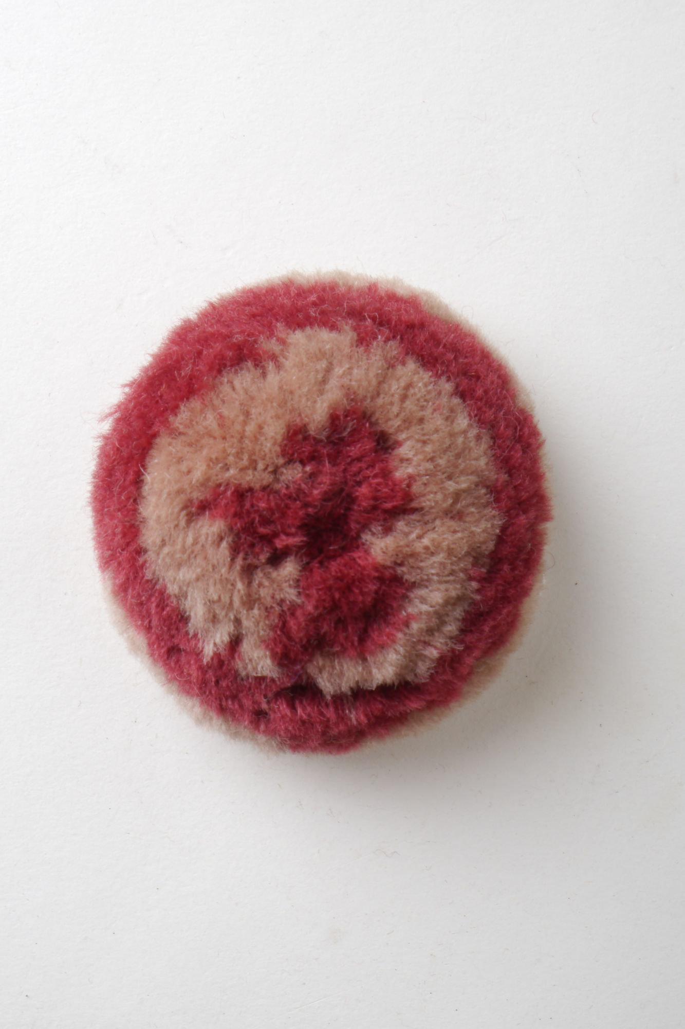 Bouffette als onderdeel voor het vervaardigen van passement