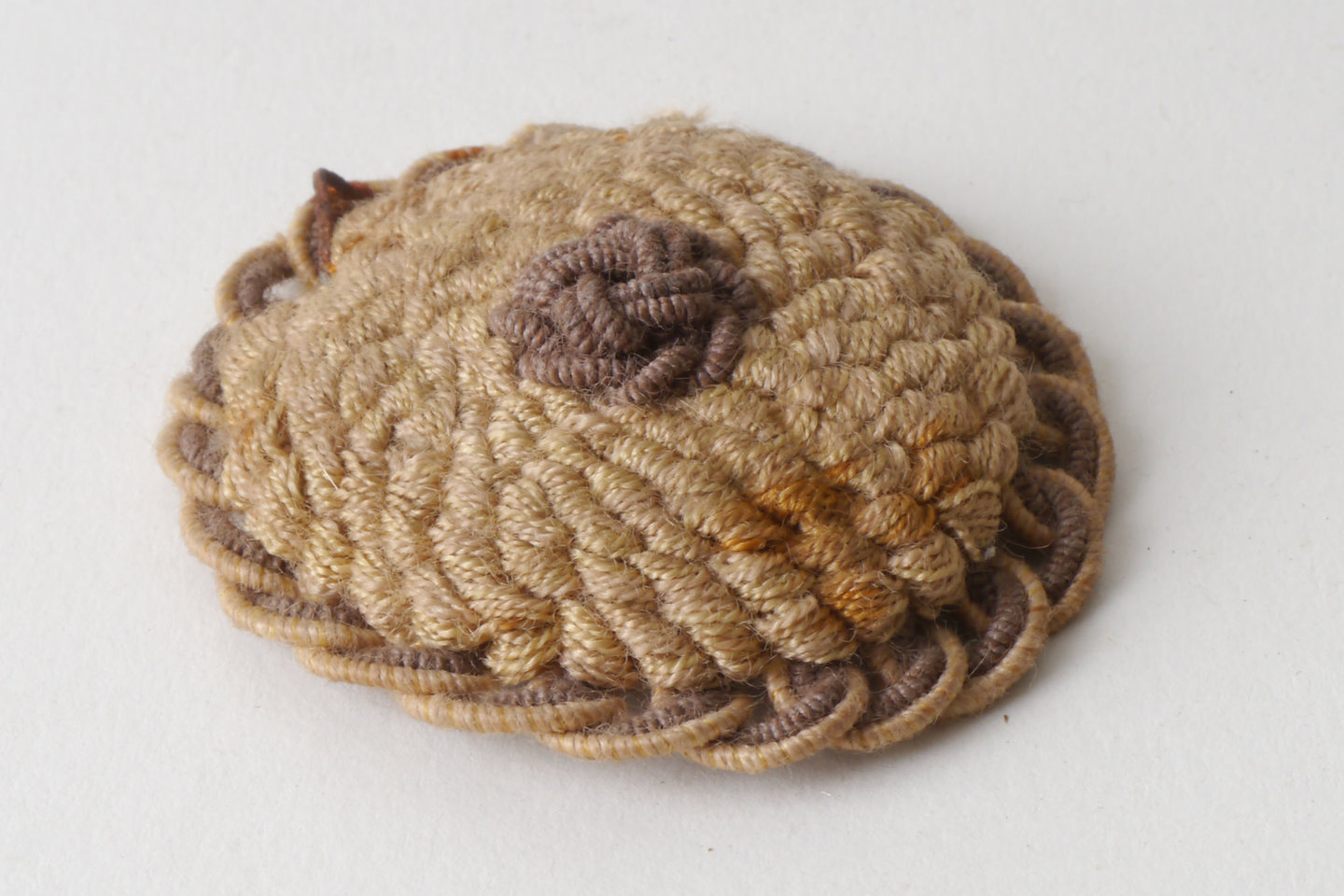 Macaron of rozet als onderdeel voor het vervaardigen van passement