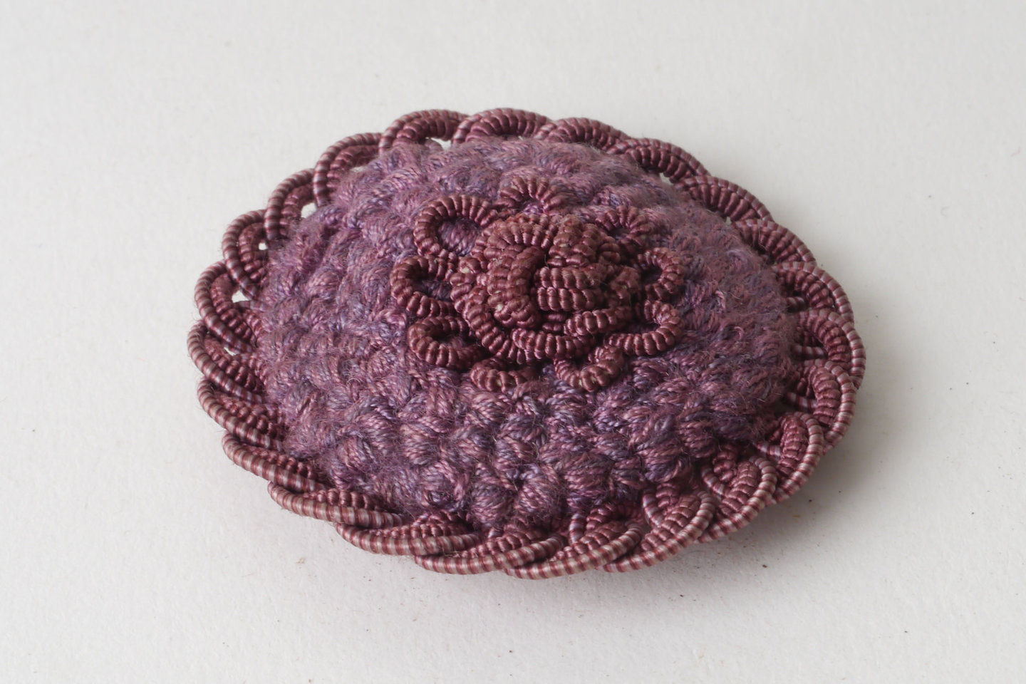 Macaron of rozet als onderdeel voor het vervaardigen van passement