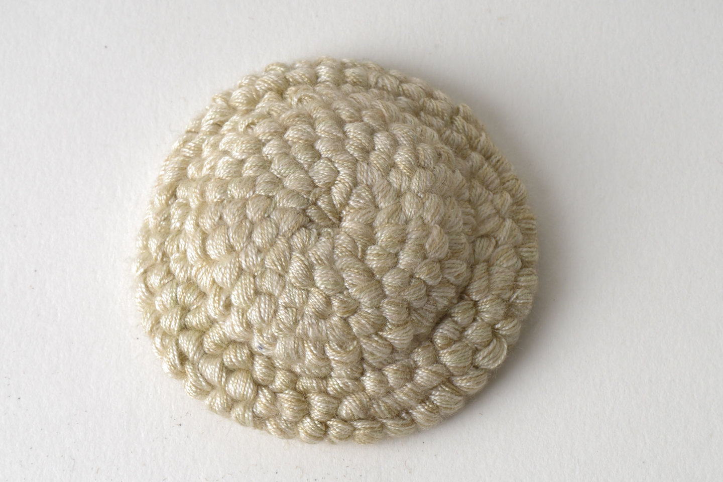 Bouffette als onderdeel voor het vervaardigen van passement