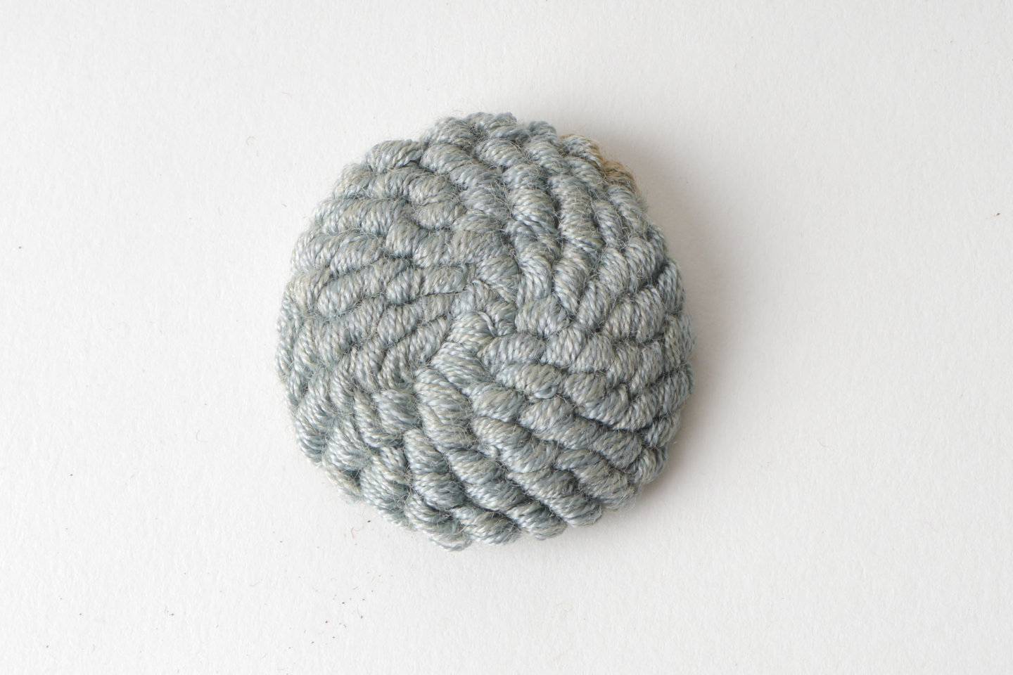 Bouffette als onderdeel voor het vervaardigen van passement