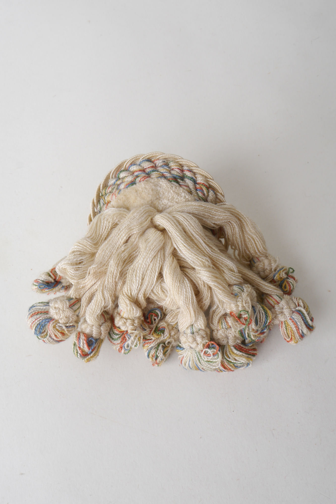 Macaron of rozet als onderdeel voor het vervaardigen van passement