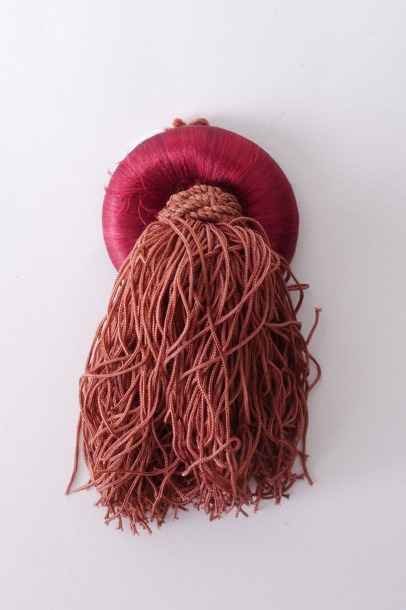 Macaron of rozet als onderdeel voor het vervaardigen van passement