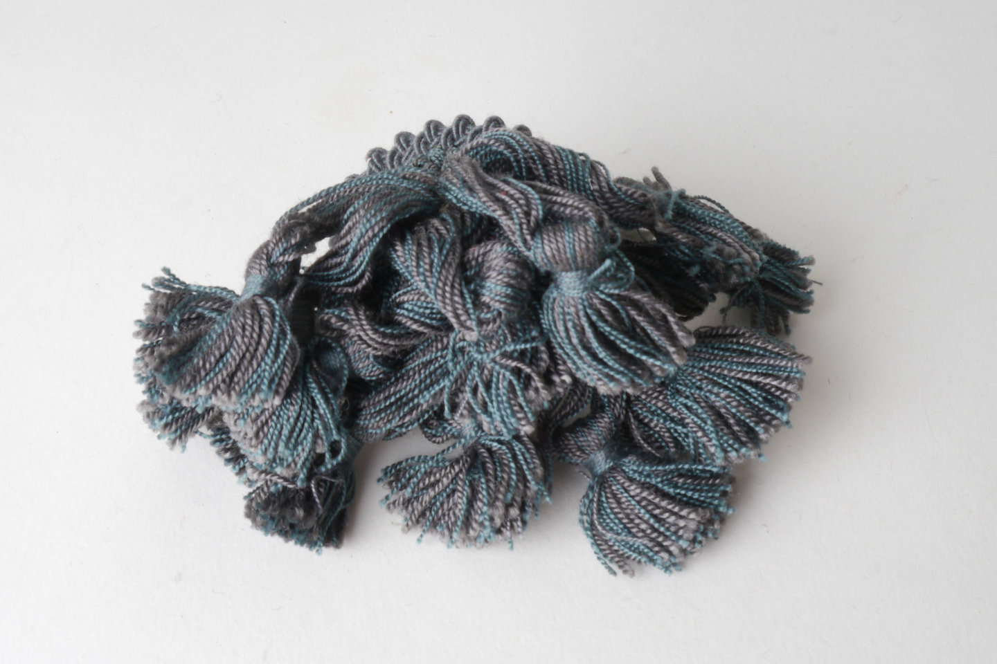 Macaron of rozet als onderdeel voor het vervaardigen van passement