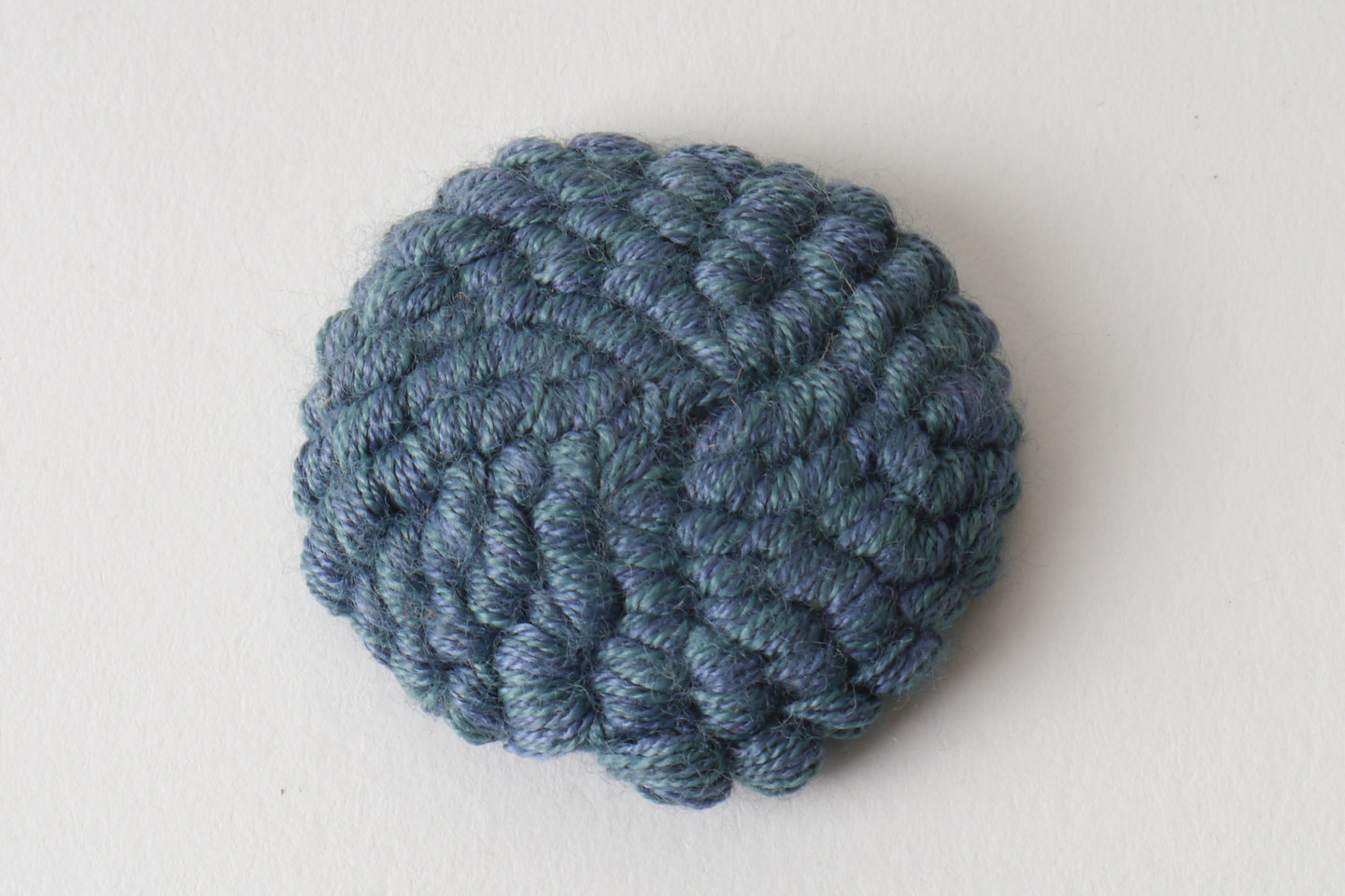 Bouffette als onderdeel voor het vervaardigen van passement